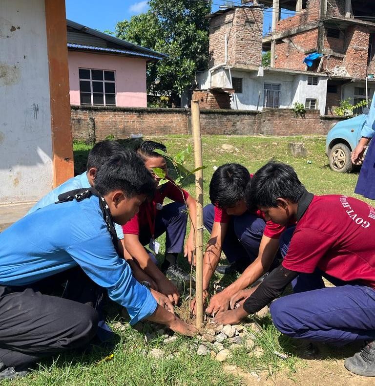 Students plant tree sapling during the drive held in different localities and educational institutions of Dimapur and Chümoukedima on June 24 and 25.